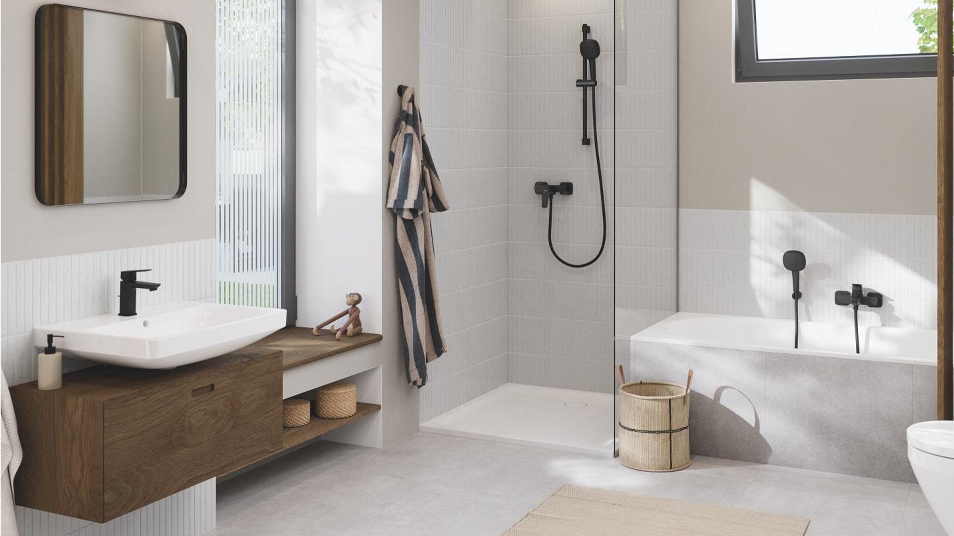 Ein modernes Badezimmer mit einer eleganten Badewanne, einer Dusche und einem stilvollen Waschbecken aus weißem Keramik.